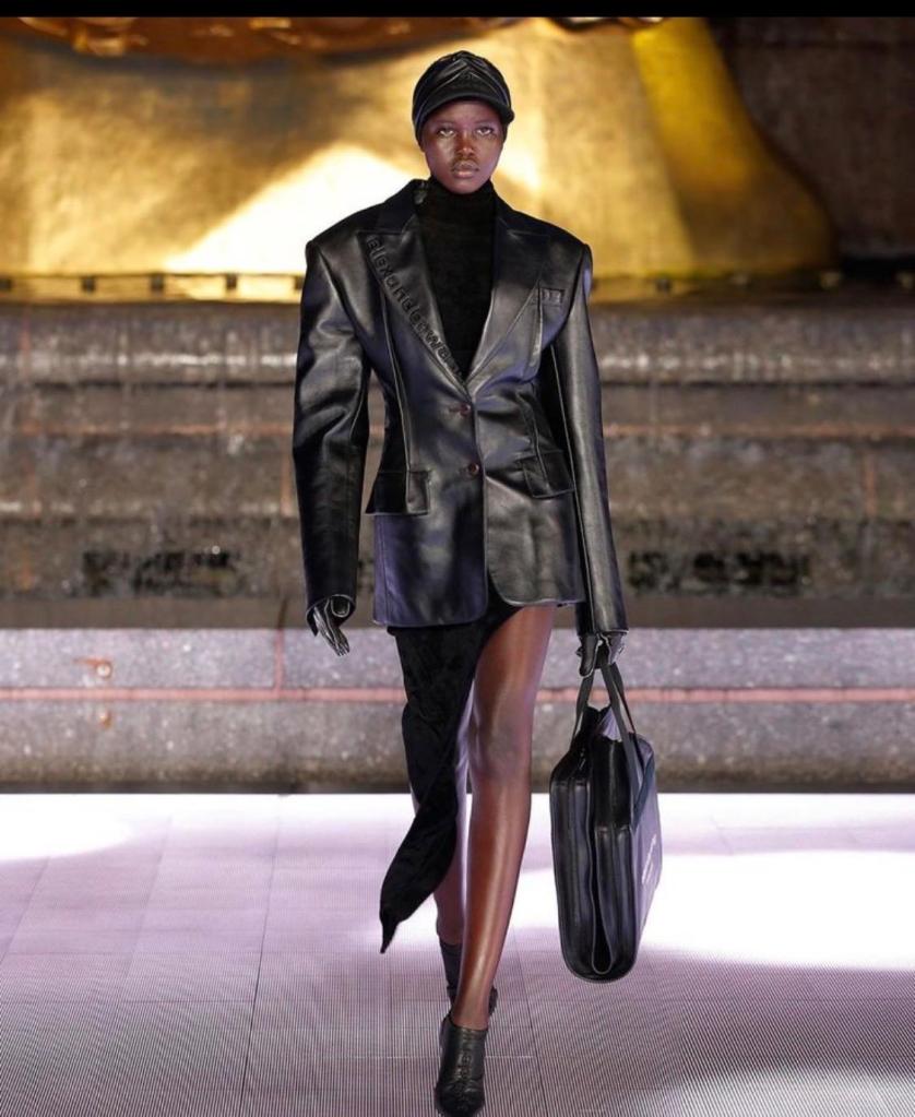 Women wearing a black leather jacket